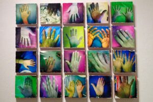 Photo of multiple colorful hand portraits