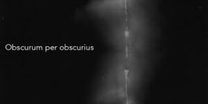 Dark image with unclear lighter streak with "Obscurum per obscurius" written in white.
