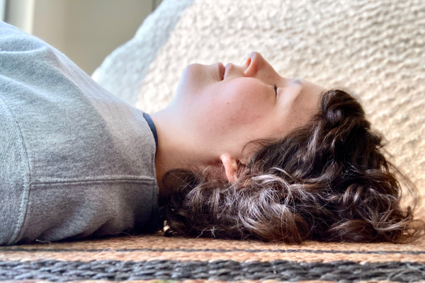 Photo of someone resting their head.