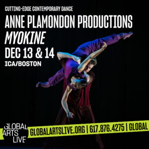 An member of Anne Plamondon Productions hangs upside down across the shoulders of another dancer.