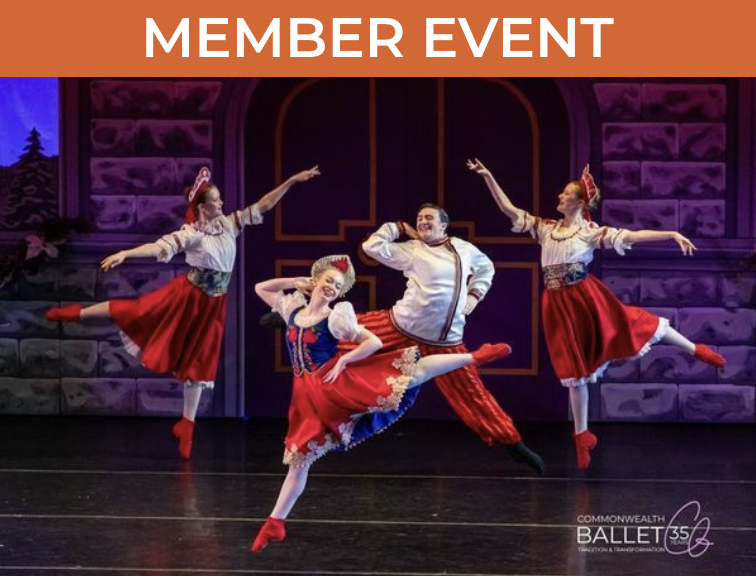 Ballet dancers in vibrant red costumes performing The Nutcracker