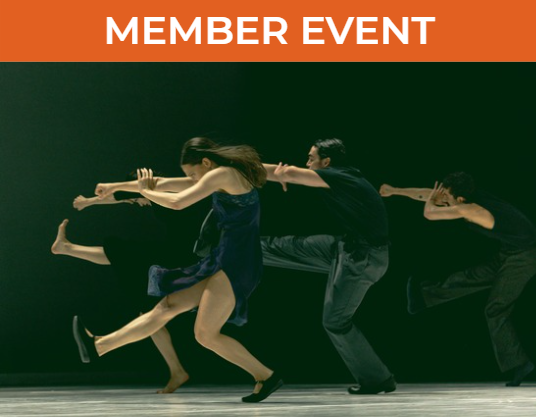 Ballet BC dancers in performance. Four dancers on stage facing to the side with one leg extended in front, the standing leg bent, and the arms outstretched in a punching position.